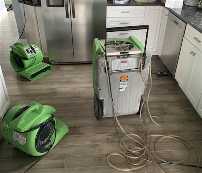 Drying equipment and dehumidifier in a kitchen.